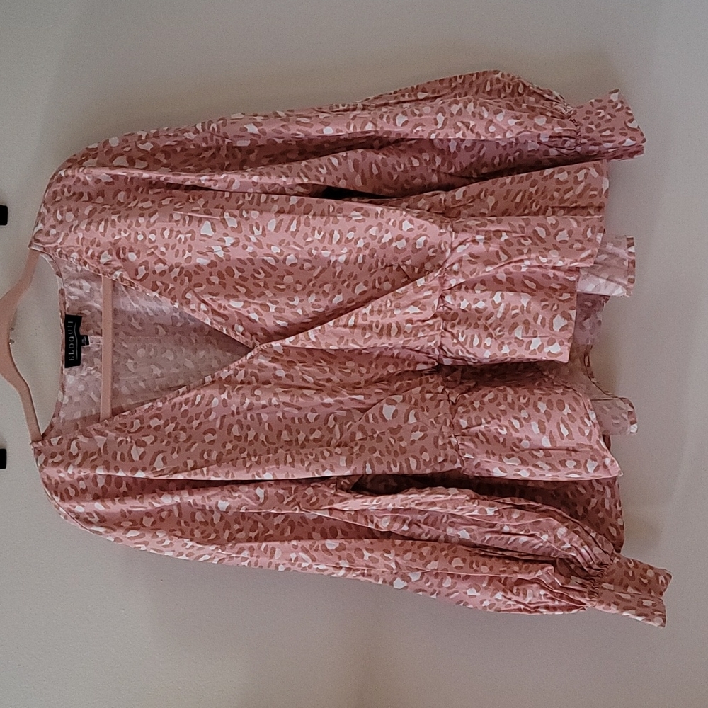 Eloquii pink leopard peplum top 24